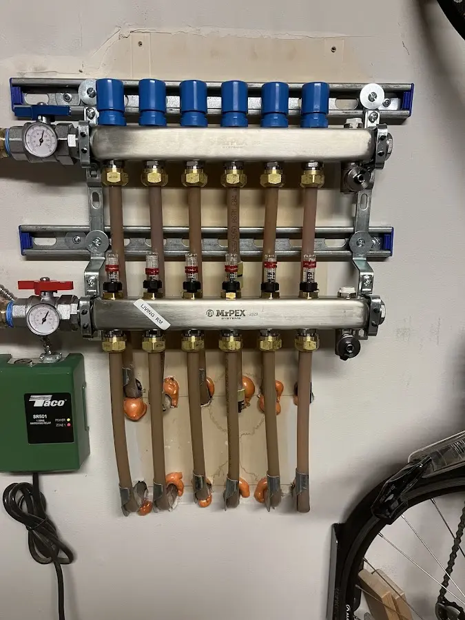 Plumber performing Gas Leak Detection at a residential property in Griswold